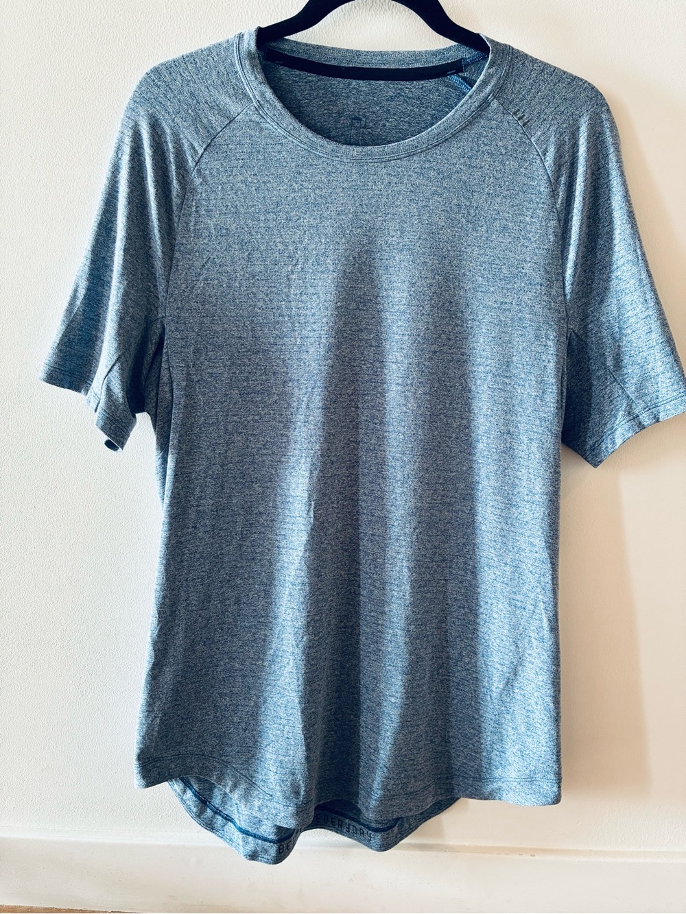 Men's Better Every Day Heather Blue Performance Crew Neck Shirt with curved hem.